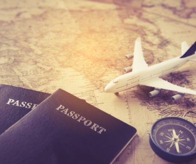 passport-plane-compass-placed-map-concept-travel